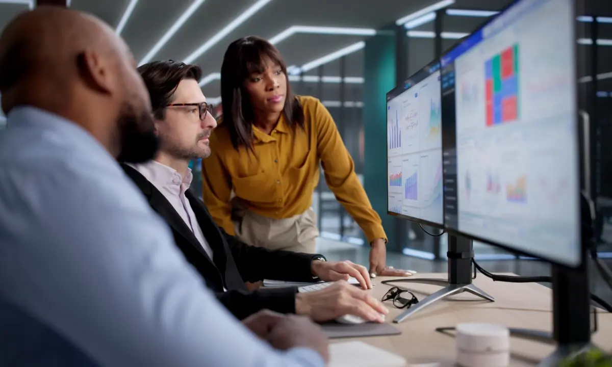 Business team reviewing no-code systems and automation performance